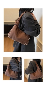 Detail of dark brown suede hobo bag featuring silver rivets and knotted strap detail