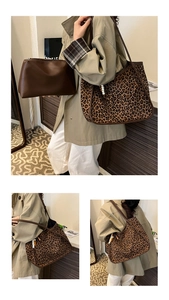 Detail view of leopard print tote bag and brown pouch with bead charm and leather straps
