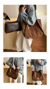 Detail of dark brown matte tote bag featuring wooden bead tassel and zip pouch accessory