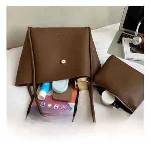 Top view of brown lychee leather tote bag showing large capacity and internal storage space