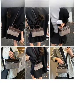 Street style view of tweed patchwork handbag with leather lid and metal lock detail