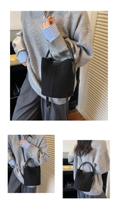 Detailed shots of black suede bucket bag showing handles, strap and soft texture
