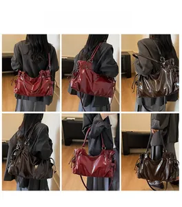 Detail shots of large glossy tote bags in burgundy and dark brown for women
