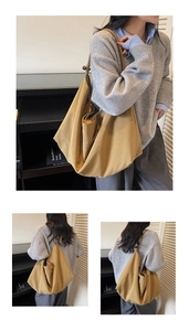 Detail of canvas tote bag with wooden bead strap accents and large capacity design
