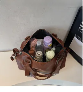Interior view showing the large capacity of the brown tote bag for daily essentials