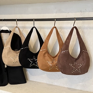 Retro suede hobo bag with star-shaped metal studs available in four earthy colors