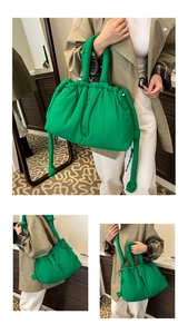 Detail of bright green nylon tote bag with puffer texture and drawstring closure