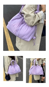 Macro view of light purple quilted tote bag with drawstring closure and soft texture