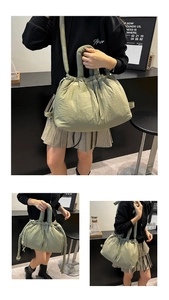 Olive green quilted puffy bag detail with drawstring closure and versatile carrying straps