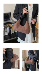 Brown suede hobo bag styled with a black blazer and white skirt in a home office setting