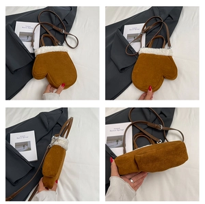 Detail shots of brown suede glove-shaped crossbody bag with white faux fur trim and strap