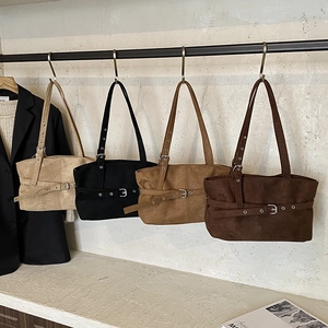 Vintage matte suede tote bags in beige, black, and brown with metallic buckle detail