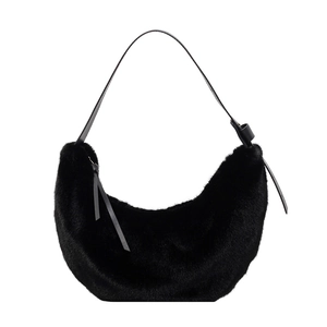 Sac à main chic en fausse fourrure noire avec bandoulière en cuir et doubles pompons