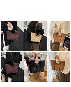Quilted tote bags in various colors featuring metal chain straps and suede texture
