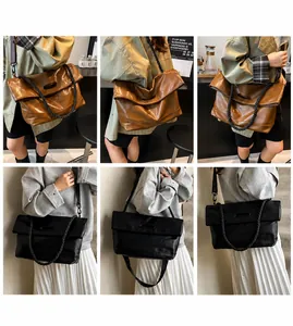Detail view of large capacity crossbody bags in brown and black with thick rope handles