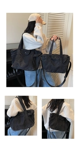 Detail view of large and small charcoal denim tote bags showing multi-pocket design