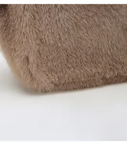 Detail shot of soft brown faux fur texture on a lightweight shoulder bag material