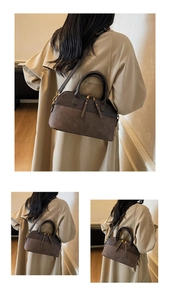Detail of coffee brown tote bag with diamond quilted stitching and gold chain strap