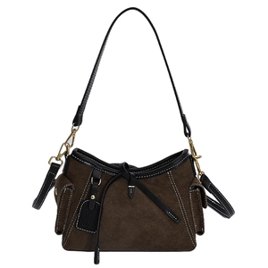 Brown suede crossbody bag with contrast white stitching and gold hardware on white background