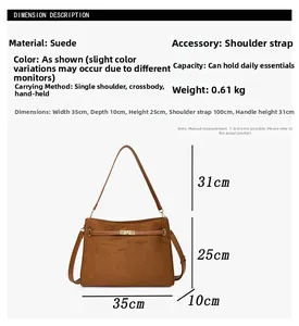 Detailed size guide of brown suede shoulder bag with 35cm width and metal lock design