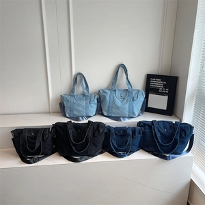 Simple denim tote bag set in light blue, dark blue and black with front metal button pocket