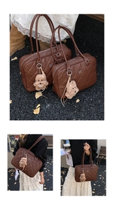 Detail of brown quilted tote bag with diamond stitching and cute plush dog charm