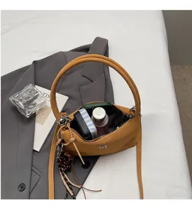 Top view of yellow leather tote bag interior showing spacious capacity for essentials