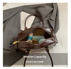 Top view of large internal capacity showing storage space for phone and cosmetics
