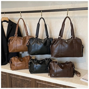 Three colors of large and small capacity tote bags displayed in a minimalist studio setting