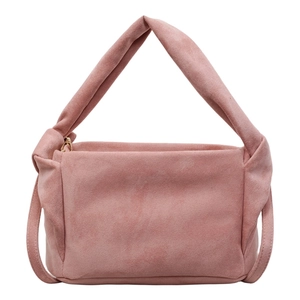 Minimalist dusty rose suede crossbody bag with a stylish twisted handle and zip closure