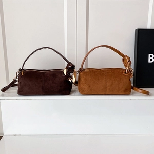 Retro suede crossbody pillow bags in coffee and caramel with metallic chain decor