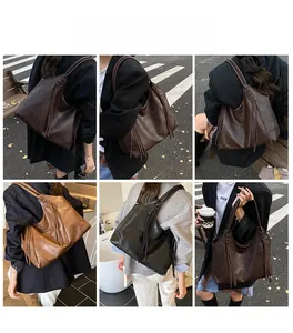 Détails du cabas en cuir vintage avec glands à franges et poignées tressées