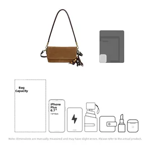 Brown suede shoulder bag interior capacity showing phone, wallet and essentials