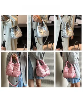 Quilted puffer bag detail in silver and pink with metallic finish and shoulder strap