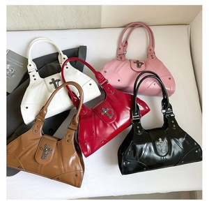 Detailed view of punk style tote bags in five colors with metallic cross hardware