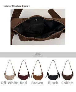 Detail of soft matte crescent bags in five colors with functional interior zipper pocket