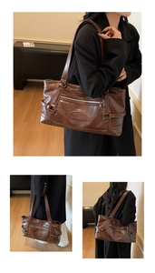 Detailed views of a dark brown vintage tote bag with soft leather texture and long straps