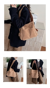 Détail du grand sac cabas en daim marron avec plusieurs poches et bandoulière large
