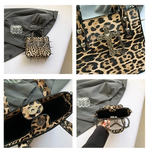 Detail showing leopard print tote with metal cross charm and punk style silver rivets