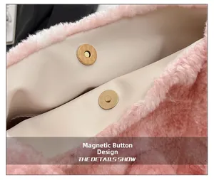 Detail showing the magnetic button closure on the pink plush bucket bag with golden hardware