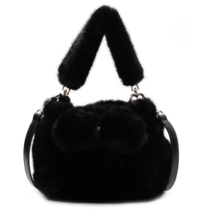 Fashionable black faux fur bucket bag with plush handle and slim shoulder strap