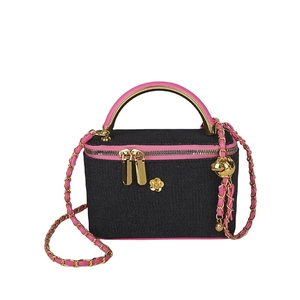 Black denim vanity bag with pink leather trim and adjustable gold ball chain strap