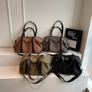 Large vintage canvas tote bags in four colors with leather straps and metal zippers