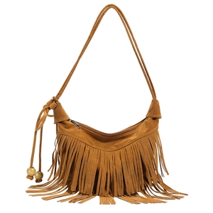 Close-up of brown suede hobo bag featuring long tassels and wooden bead strap detail