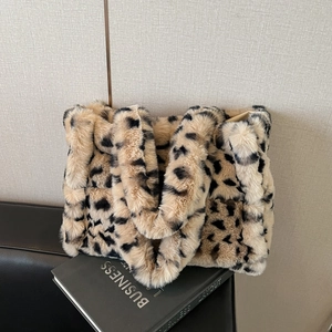 Large leopard print plush tote bag made of faux fur with double handles for winter