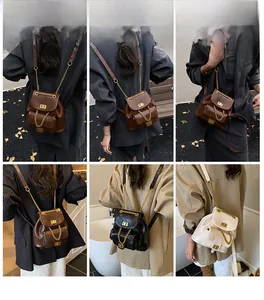 Detailansicht der modischen Stepptasche mit goldenen Kettenriemen in verschiedenen Farben