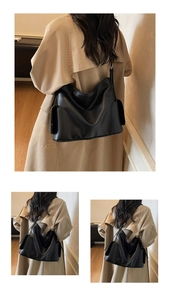 Détail du grand sac cabas noir en cuir souple avec des poches latérales pratiques