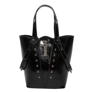 Glossy black punk tote bag with silver cross, chains and rivets on white background