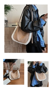Detail view of the khaki suede hobo bag featuring white faux fur trim and leather strap