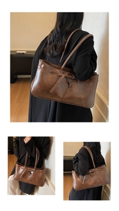 Detailed views of a vintage brown leather tote bag with stylish buckle strap and large capacity